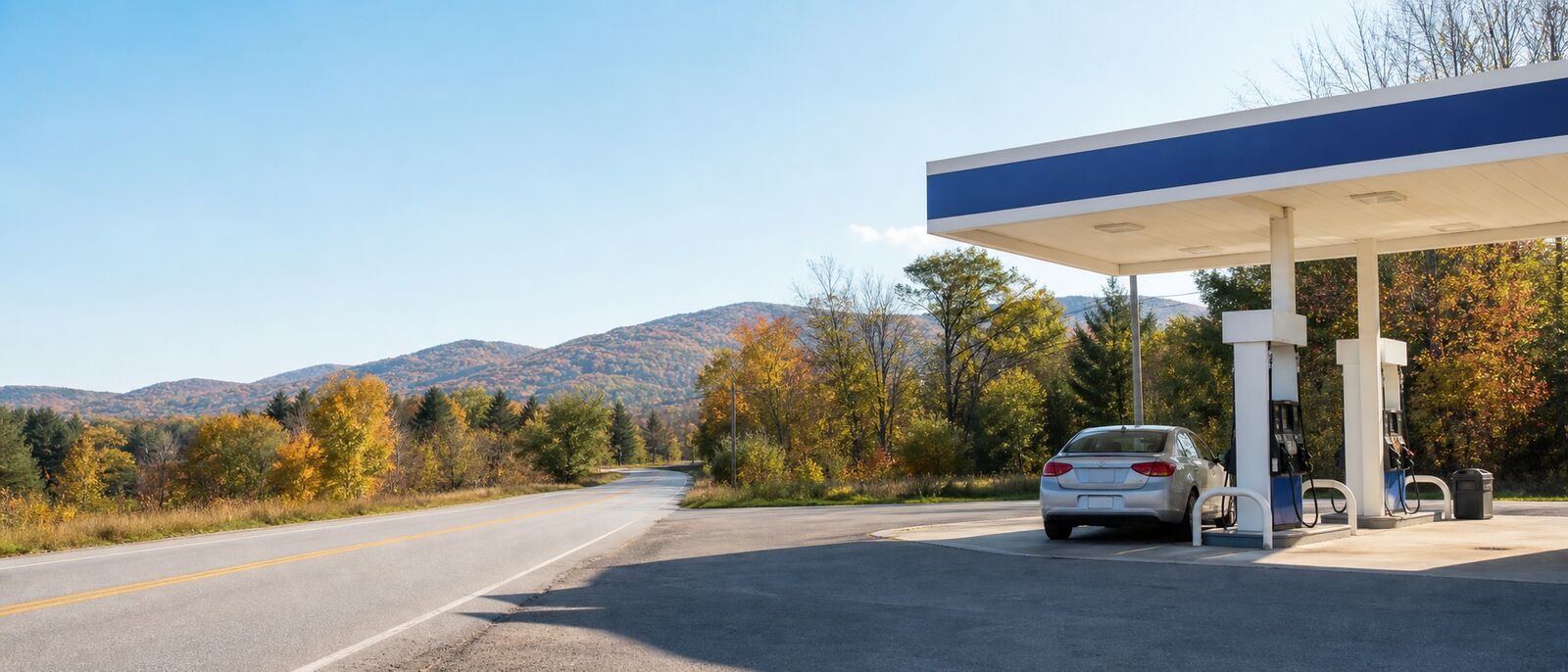 A gas station beside a wooded Western Massachusetts road